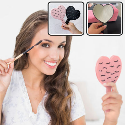 femme brosse soucils avec miroir de poche maxima nomade