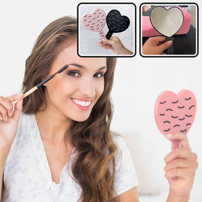 femme brosse soucils avec miroir de poche maxima nomade