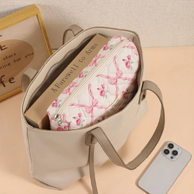 Trousse maquillage iota professionnel dans sac à main